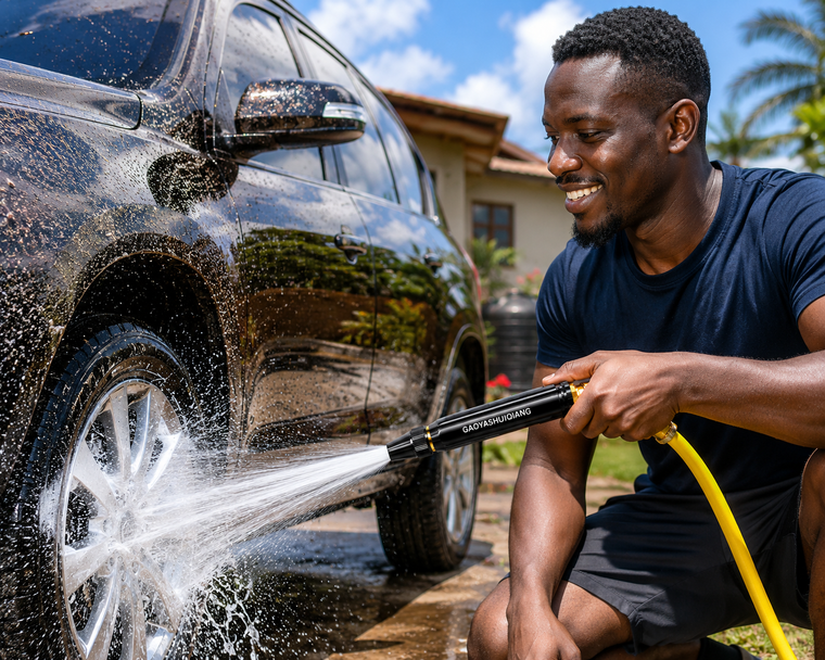 High pressure hose nozzle washing a car