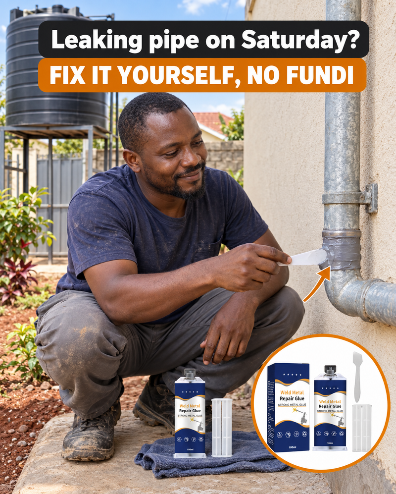 Kenyan man pressing grey metal epoxy onto a pipe joint in his compound